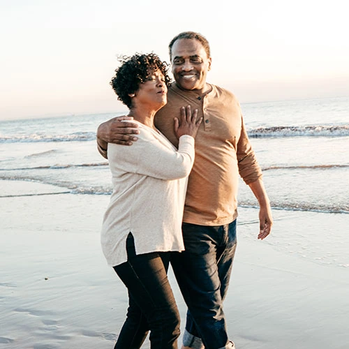 patient walking with spouse